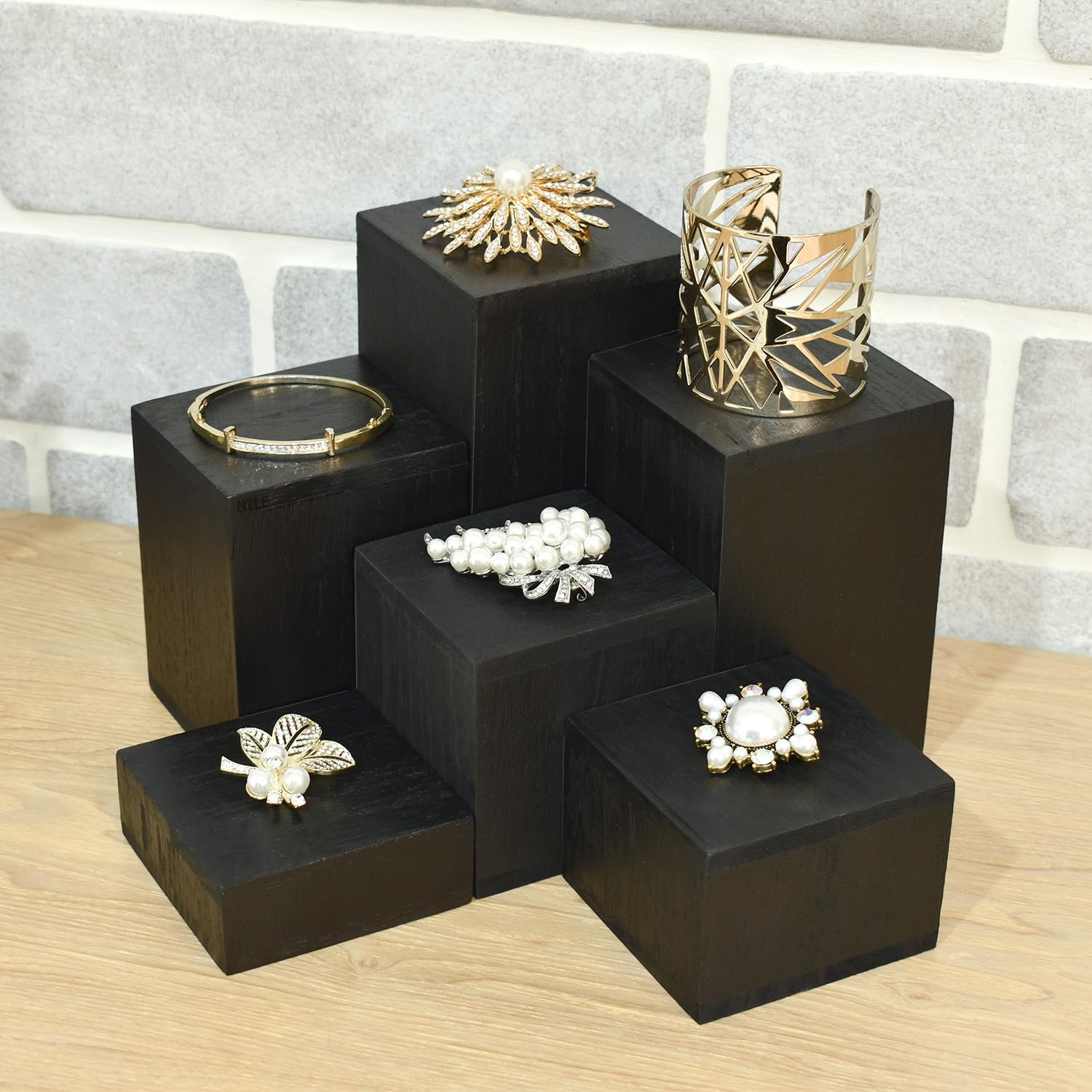 MOOCA black display risers add sleek style to any counter