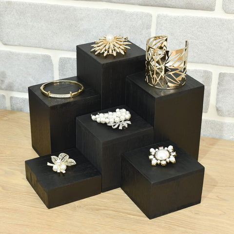 MOOCA black display risers add sleek style to any counter