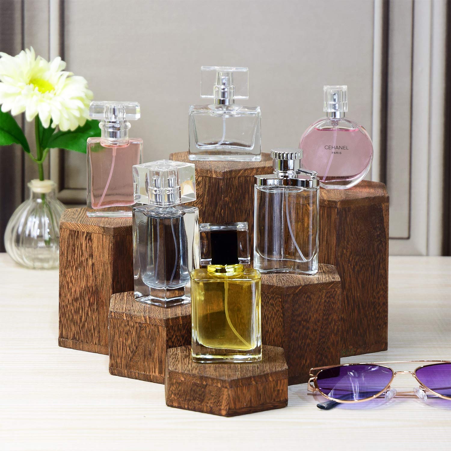 Six-piece risers arranged for tiered merchandising by MOOCA