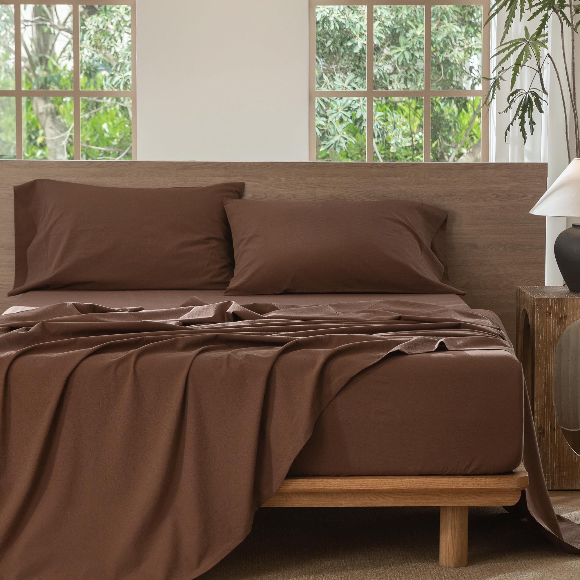 MooMee bedding in cocoa brown elevates cozy, resort-inspired bedroom vibe.