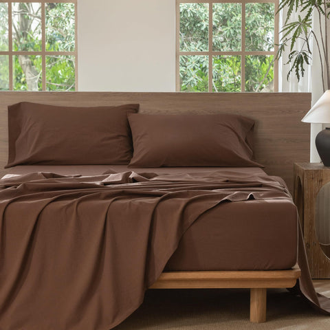 MooMee bedding in cocoa brown elevates cozy, resort-inspired bedroom vibe.