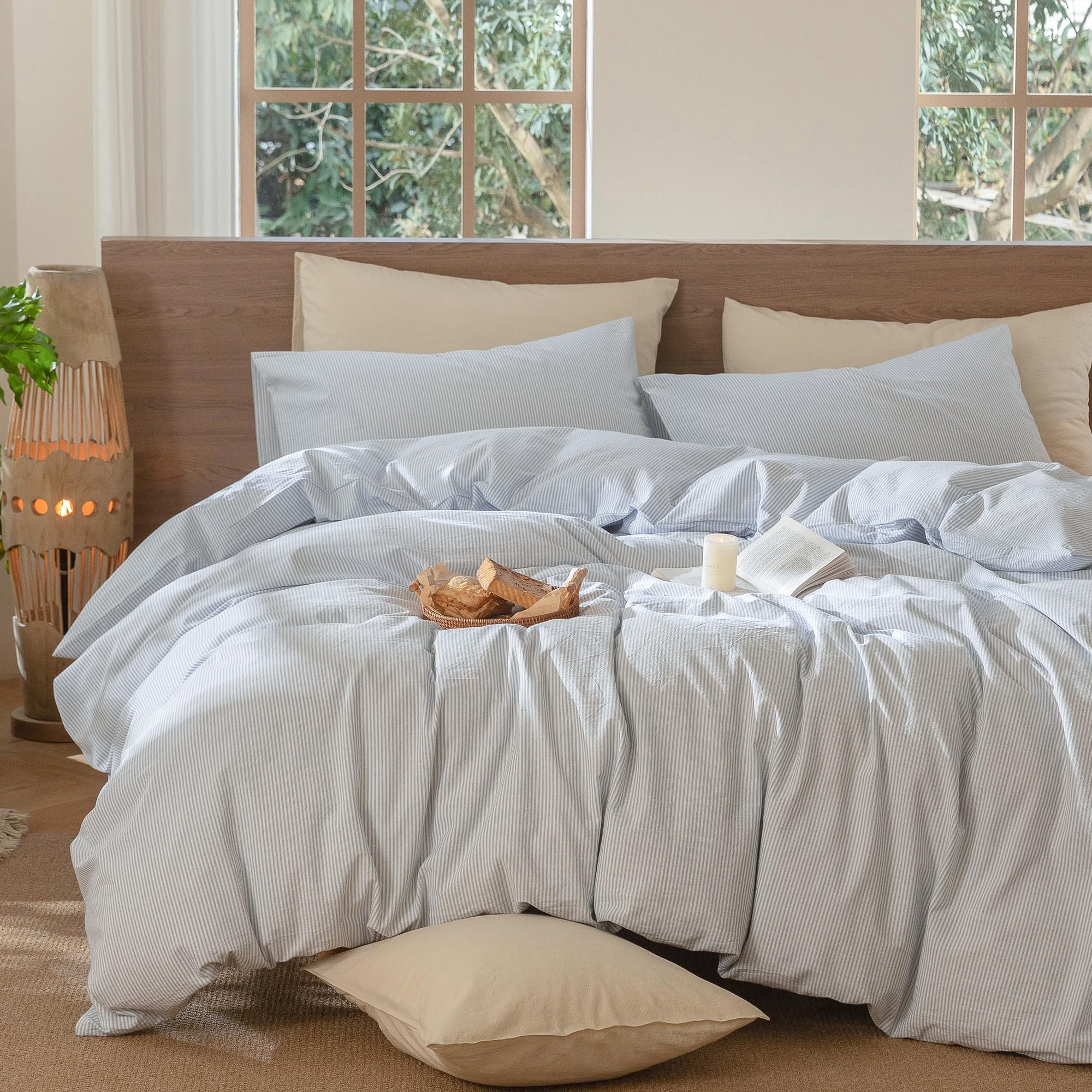 MooMee bedroom scene featuring pinstripe duvet cover for resort-like look