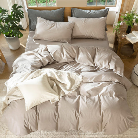 MooMee heathered-taupe bed scene: versatile color for modern decor