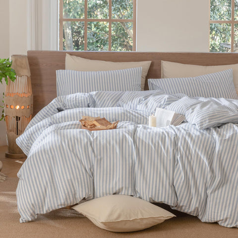 MooMee cornflower blue and white striped bedding elevates bedroom decor