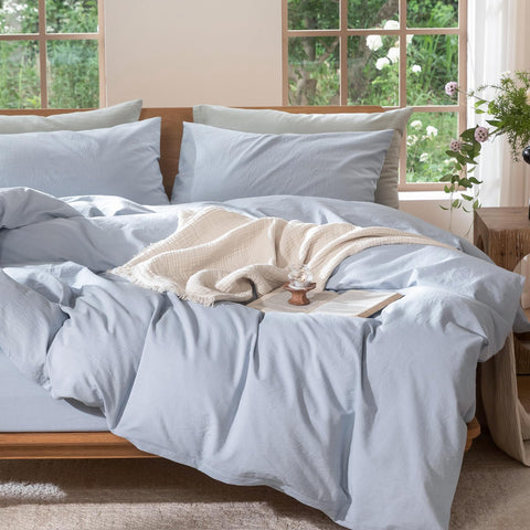 Bedroom setup shows MooMee cornflower blue set adding crisp, resort-inspired ambiance.