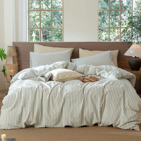 MooMee striped duvet cover set in sage green and white for a breathable bedroom look
