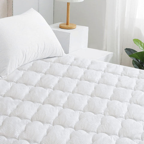 Moonsea queen mattress pad on bed setup demonstrates a neat sleep surface.