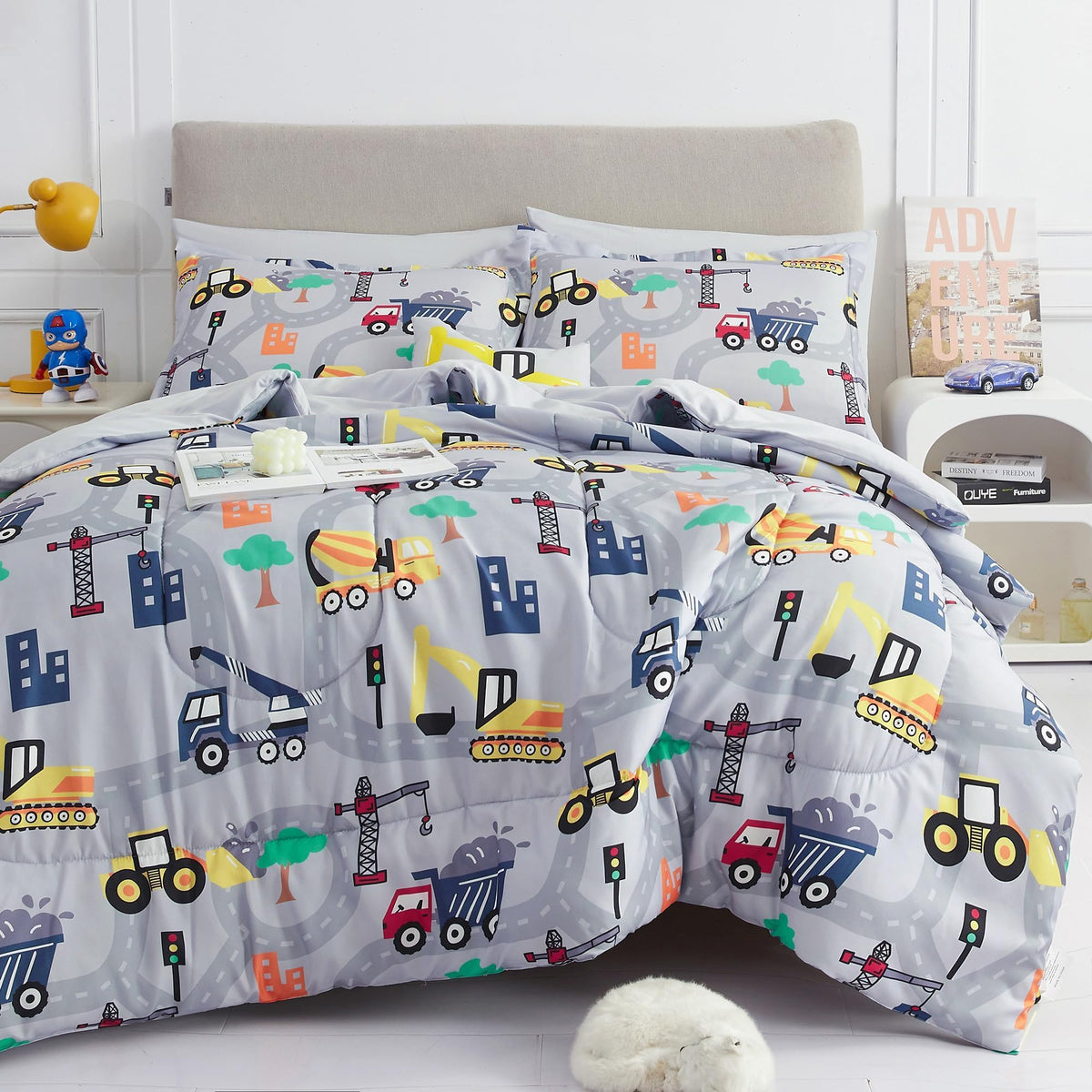 Mooreeke Excavator twin comforter in a boy’s room, bold print and soft texture.