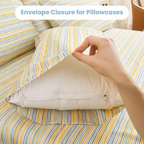 Mooreeke pillowcases complete the striped bedding ensemble.
