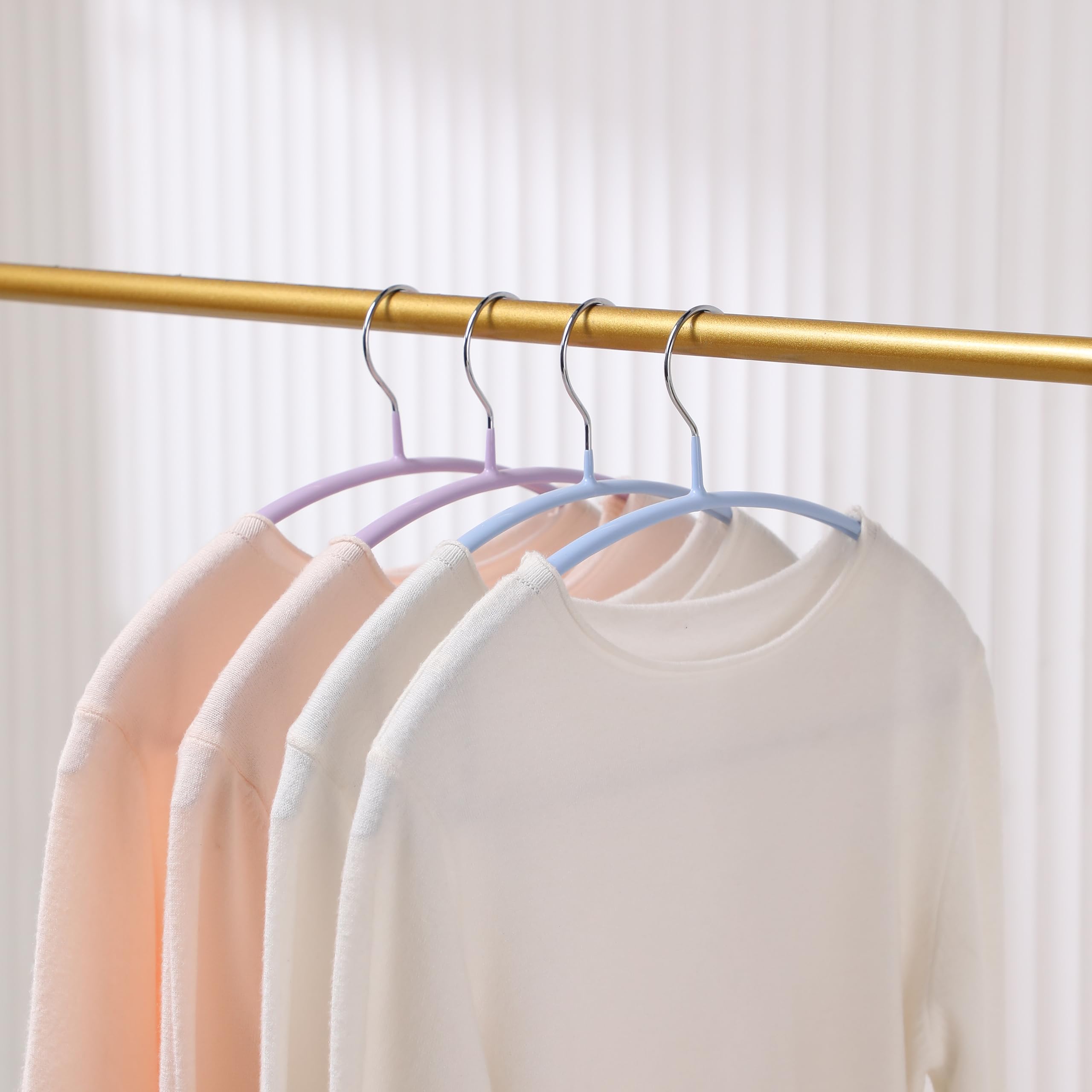 MOPALL hangers help organize sweaters and knitwear neatly.