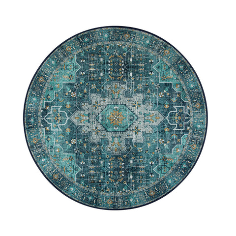 Moynesa distressed teal round rug suits boho and traditional interiors.