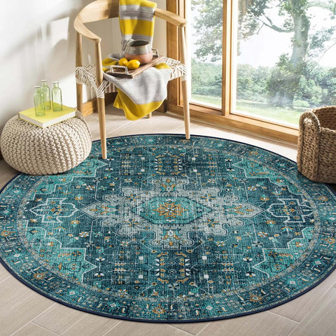Moynesa ultra-thin round rug in teal with medallion, ideal for a busy entryway.