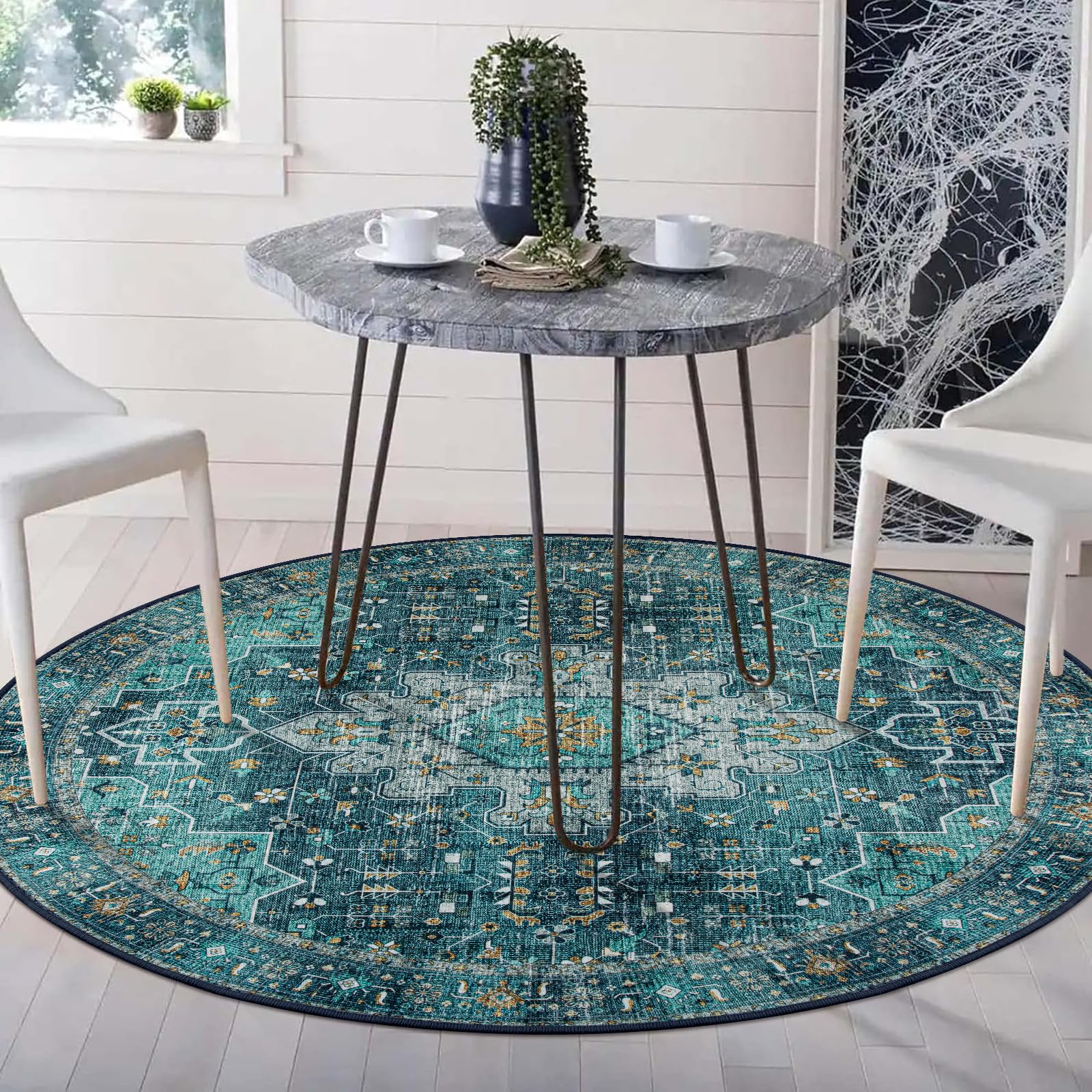 Moynesa vintage medallion teal round rug adds timeless style to any room.