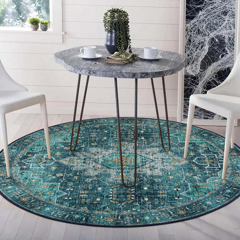 Moynesa vintage medallion teal round rug adds timeless style to any room.