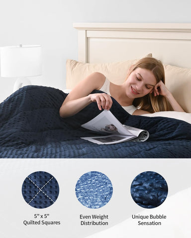 Mr. Sandman weighted blanket navy draped over bed for relaxing evenings