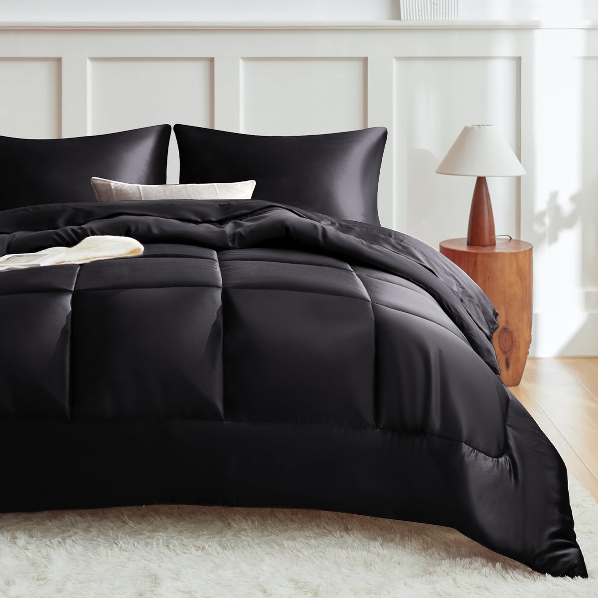 MR&HM king size comforter on bed in black for all-season warmth and elegance