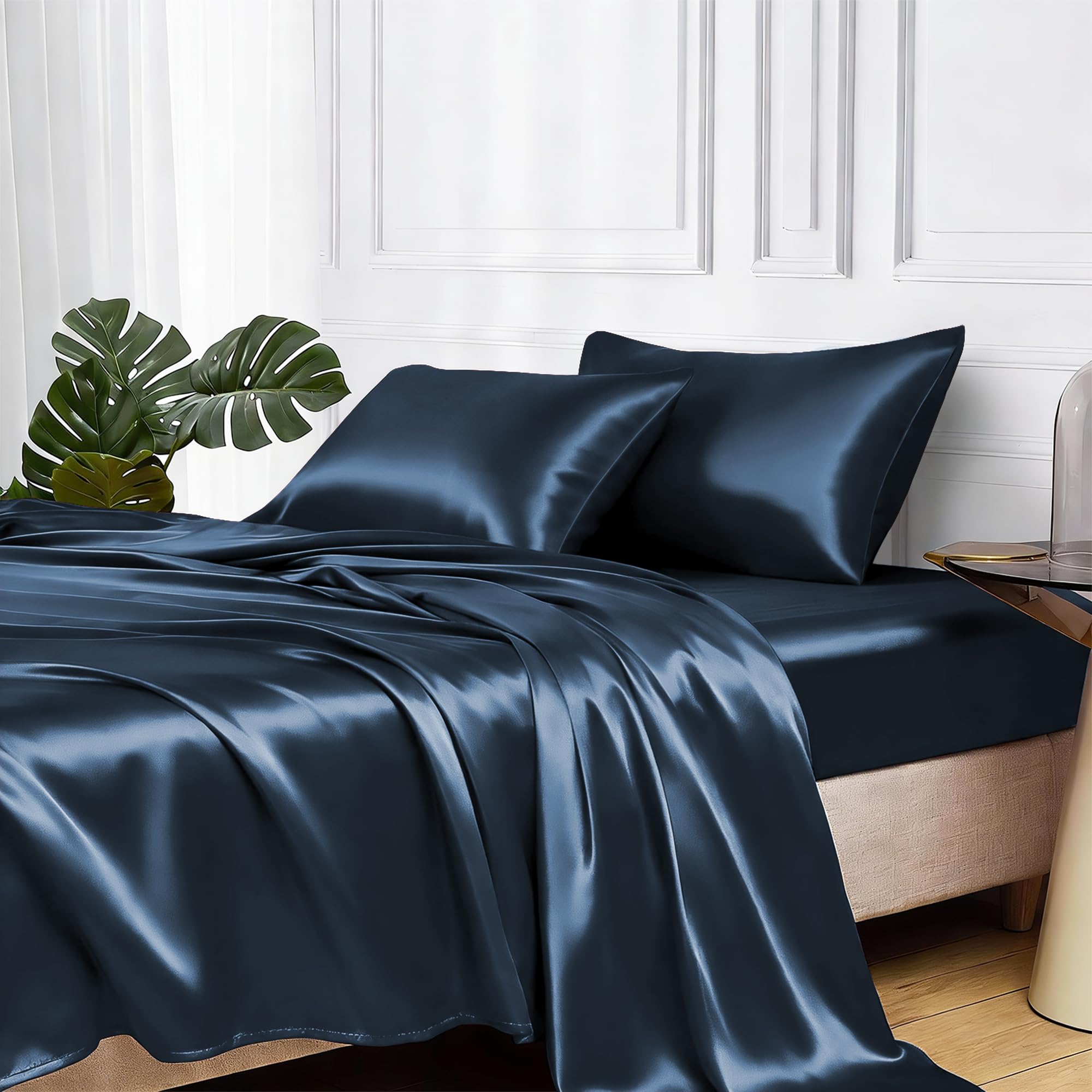 MR&HM satin bed sheets with elastic corner straps prevent slipping on a queen mattress.