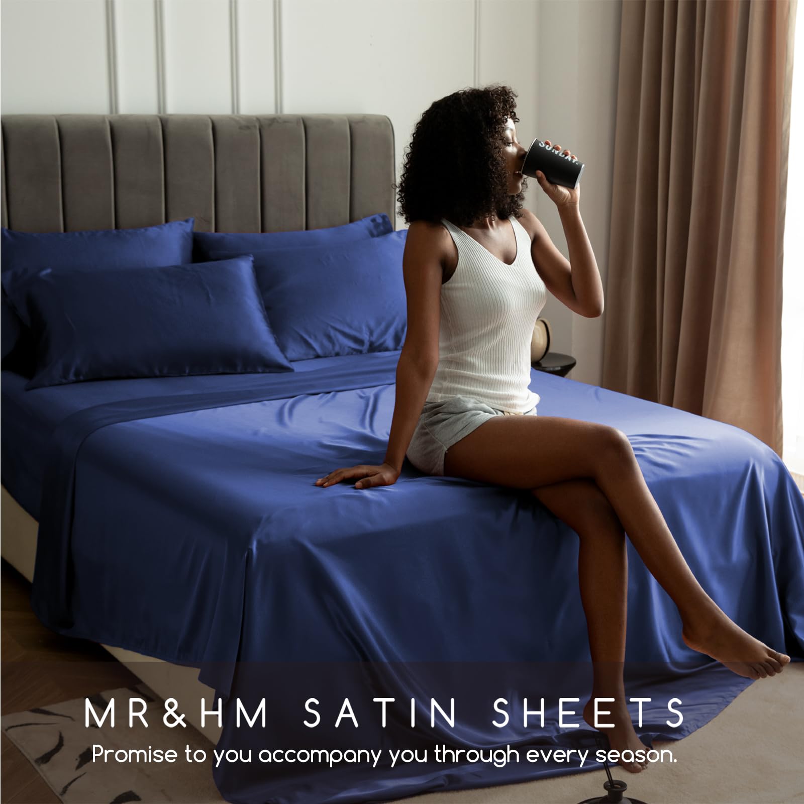 MR&HM navy satin bed sheets on styled bedroom setup