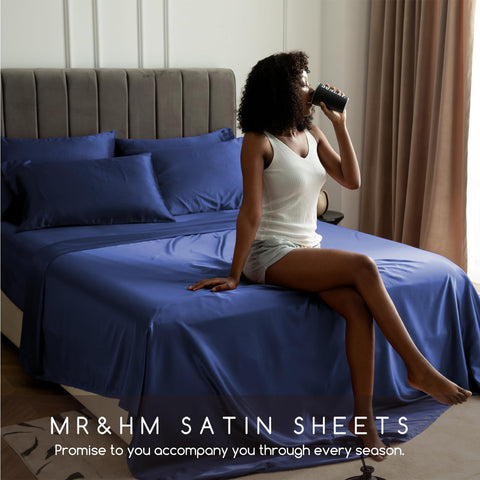 MR&HM navy satin bed sheets on styled bedroom setup