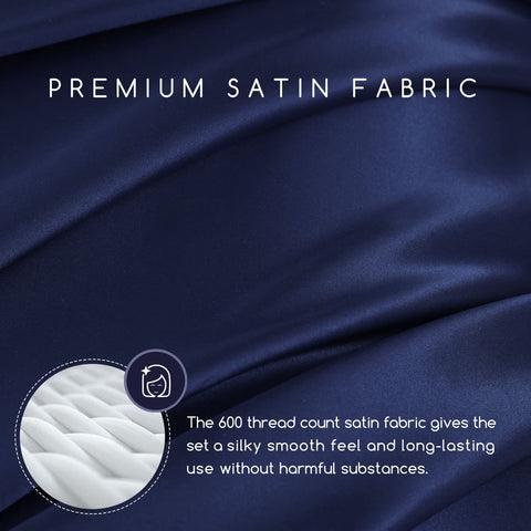 MR&HM satin fitted sheet with 15-inch deep pocket on navy bed