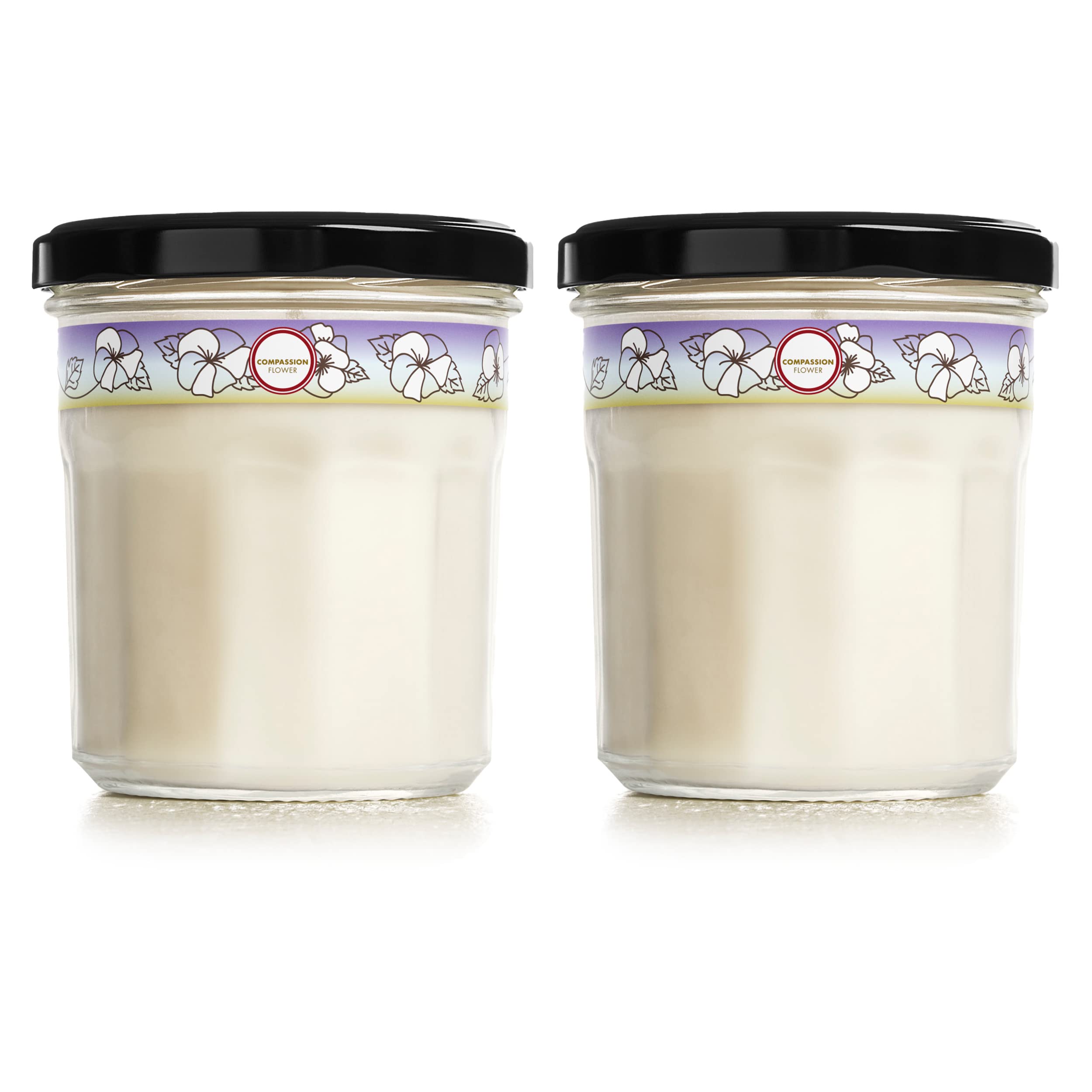 Mrs. Meyer's Compassion Flower candle in a recyclable jar for relaxing spaces.