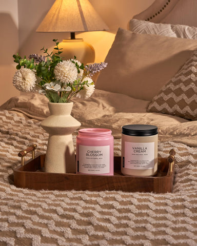 M&SENSE candle lit scene, warm glow in a room.