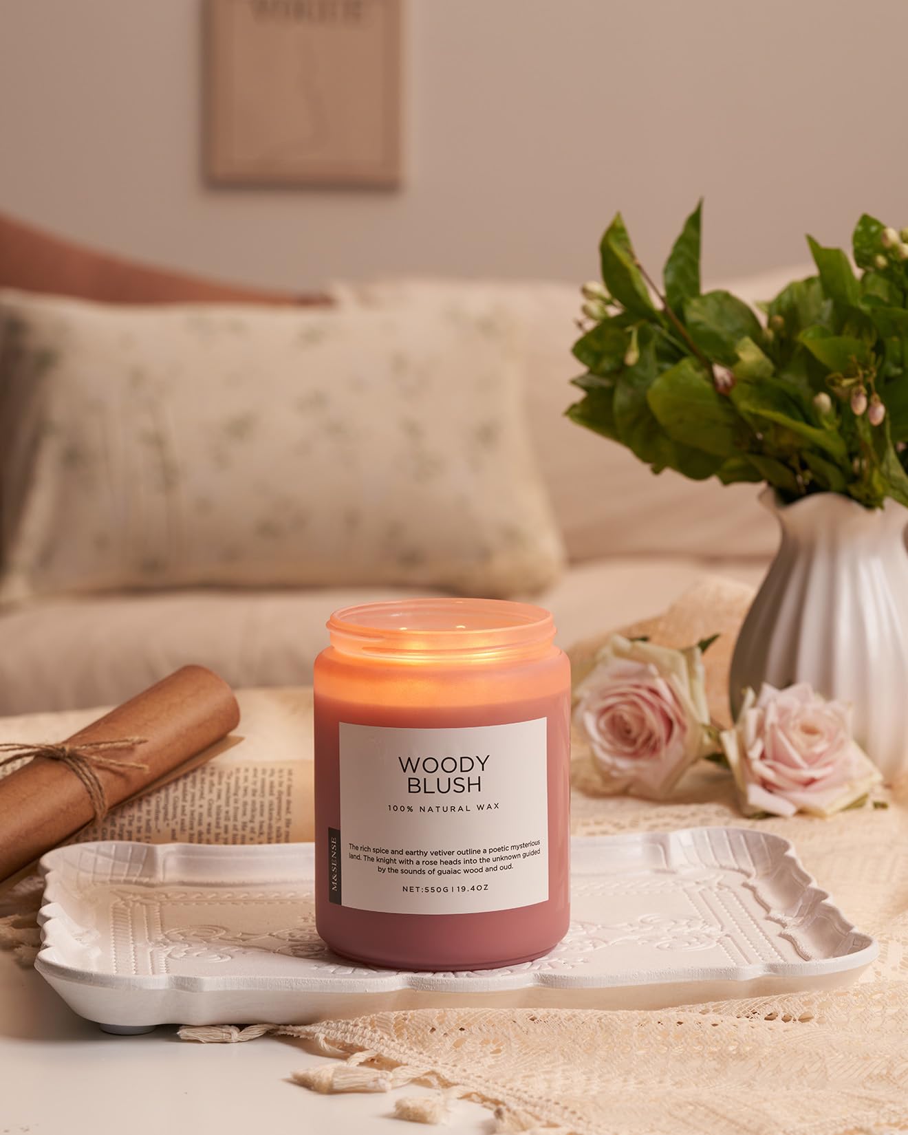Candle lit glow fills a cozy room with Gardenia Jasmine ambiance.
