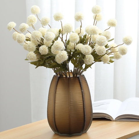 MSIUE long-stem faux flowers with flexible branches for easy vase shaping.