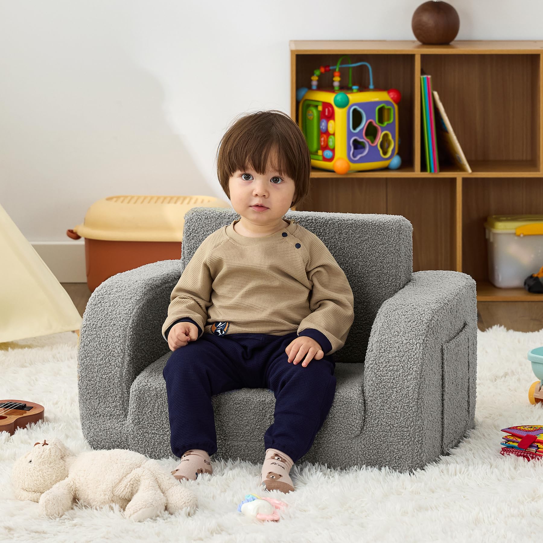 Muamelop toddler couch side view emphasizes its compact, portable design.