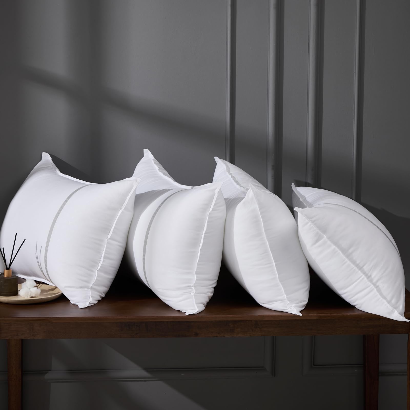 MUFEW queen set of four pillows with true size and edge-to-edge firmness.