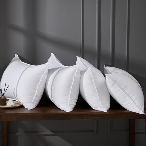 MUFEW queen set of four pillows with true size and edge-to-edge firmness.