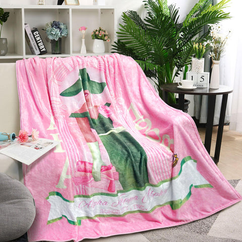 MULTIC ultra-soft flannel blanket drapes smoothly on a sofa for cozy lounging