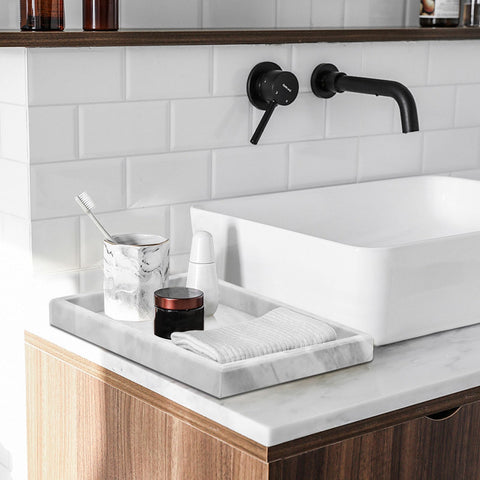 MULWR marble tray featuring perfume and watches for stylish vanity organization