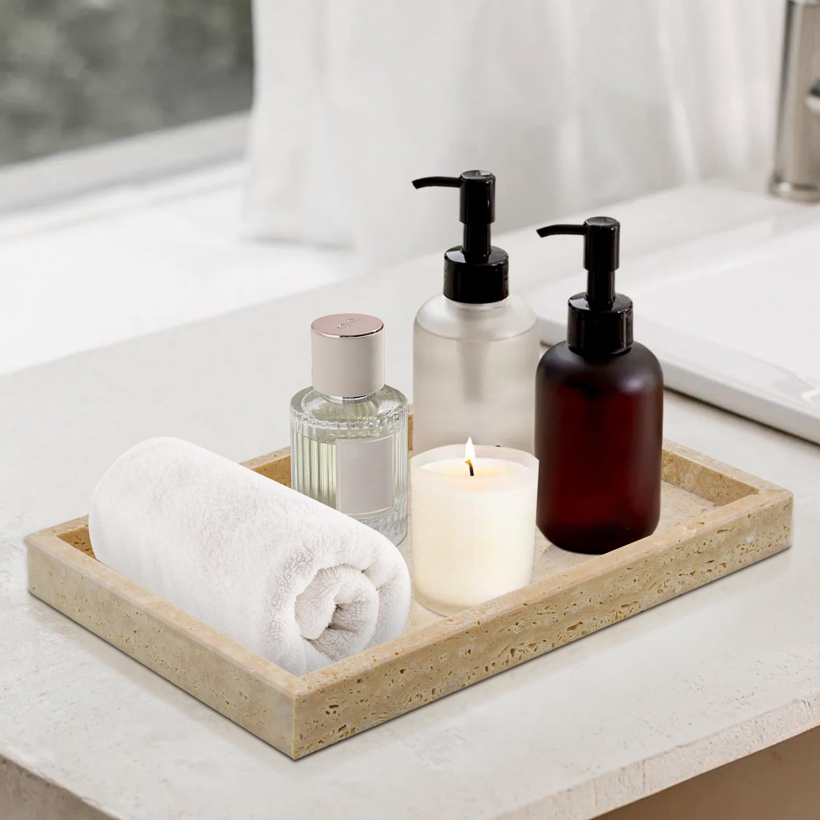 MULWR travertine tray helps organize essentials on the sink.