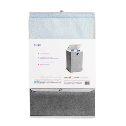 Munchkin Laundry Hamper grey color complements nursery decor while keeping laundry tidy.
