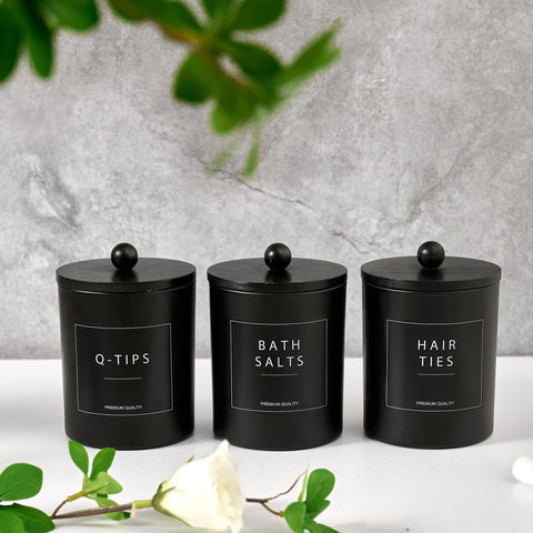 Muveka bamboo tray display complements black glass canisters on the counter.