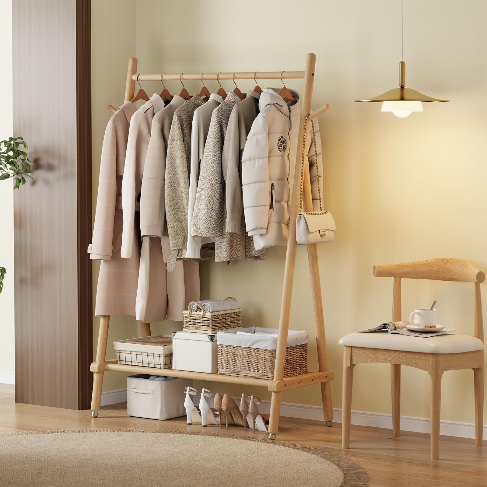 Muwuele solid wood clothing rack in entryway offers portable organization for outerwear.