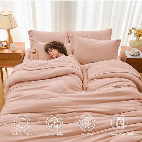 MUXHOMO rose-gold comforter close-up highlighting cloud-like down-alternative warmth without heaviness.