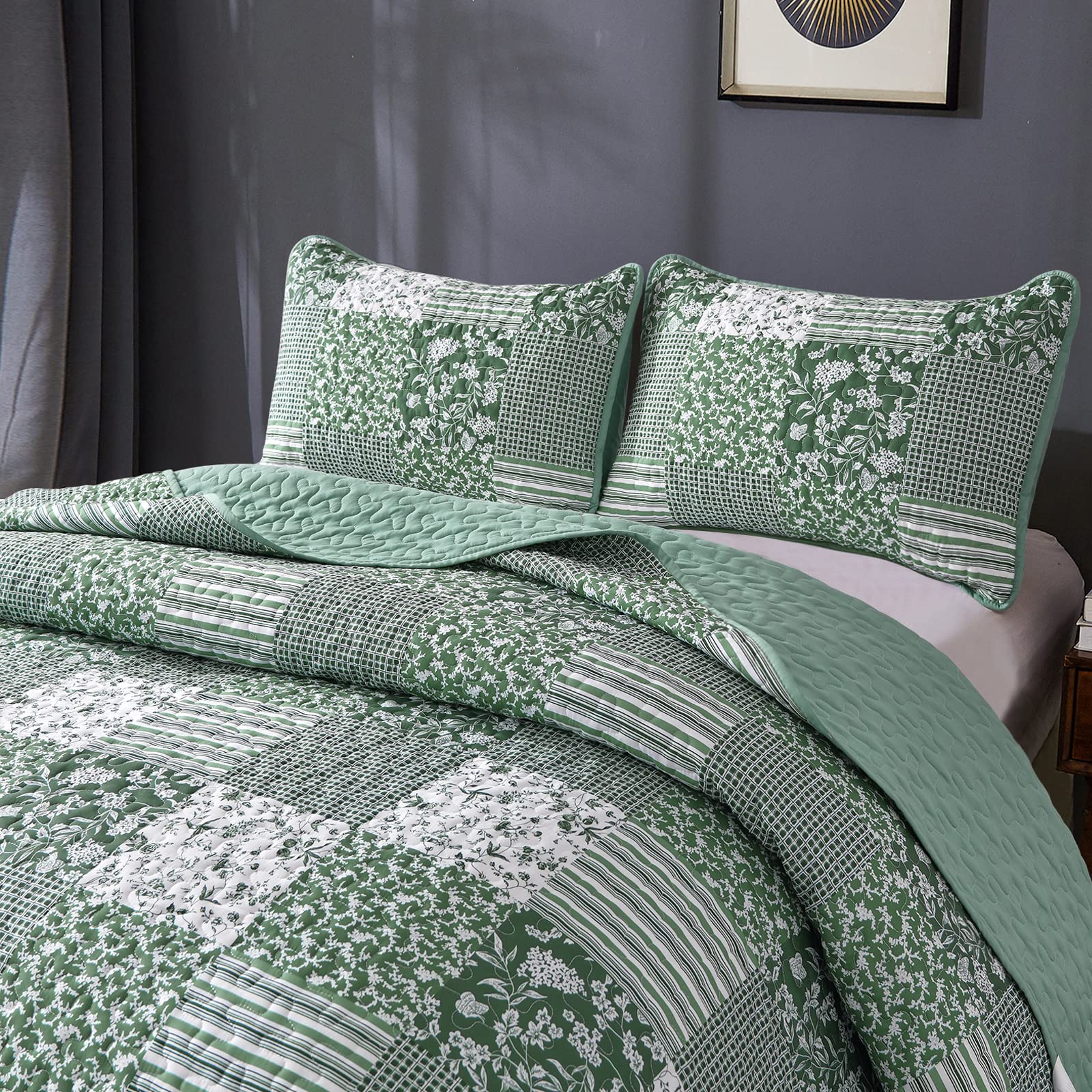 Two matching pillow shams complete the coordinated bedding set.
