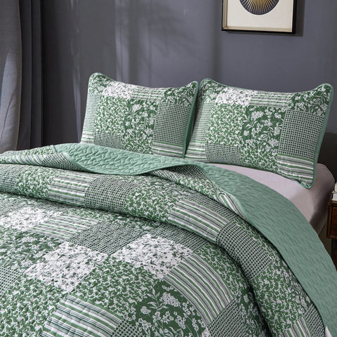 Two matching pillow shams complete the coordinated bedding set.
