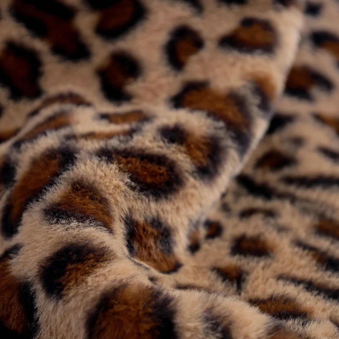 MYRU Velboa leopard blanket on couch demonstrates cozy warmth