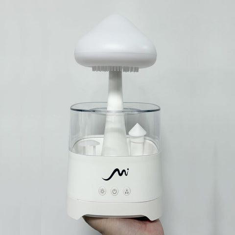 MYSTIQ Rain Cloud humidifier modern cloud design enhances bedroom décor.