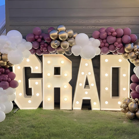 Mythcloud mosaic grad letters provide eye-catching decor for classrooms and parties.