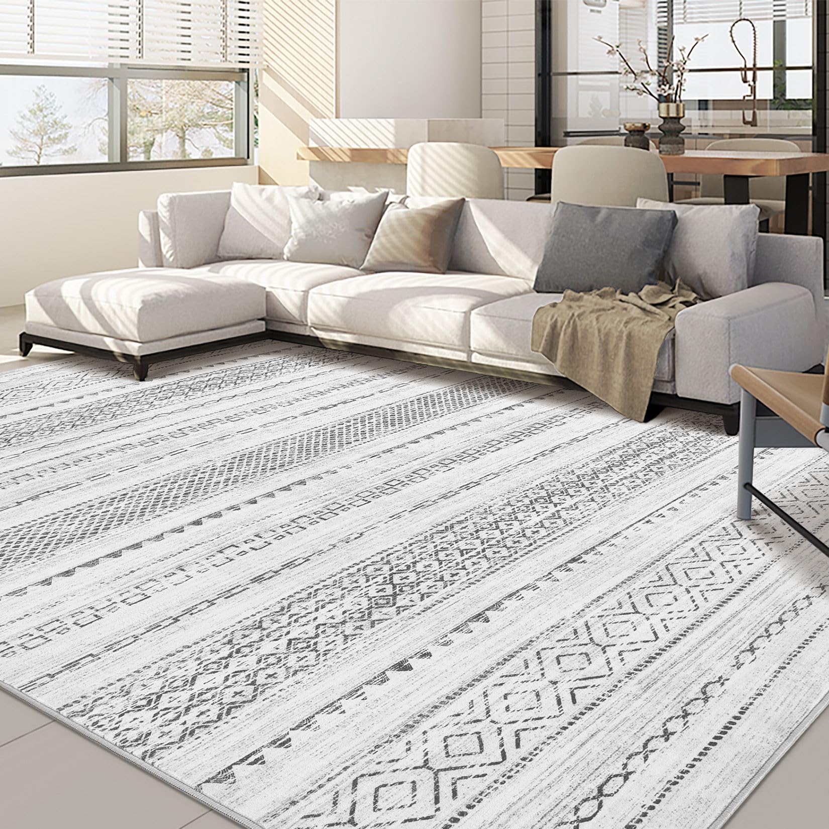 Nakagishi 9x12 area rug in living room with soft, comfortable texture for family spaces.