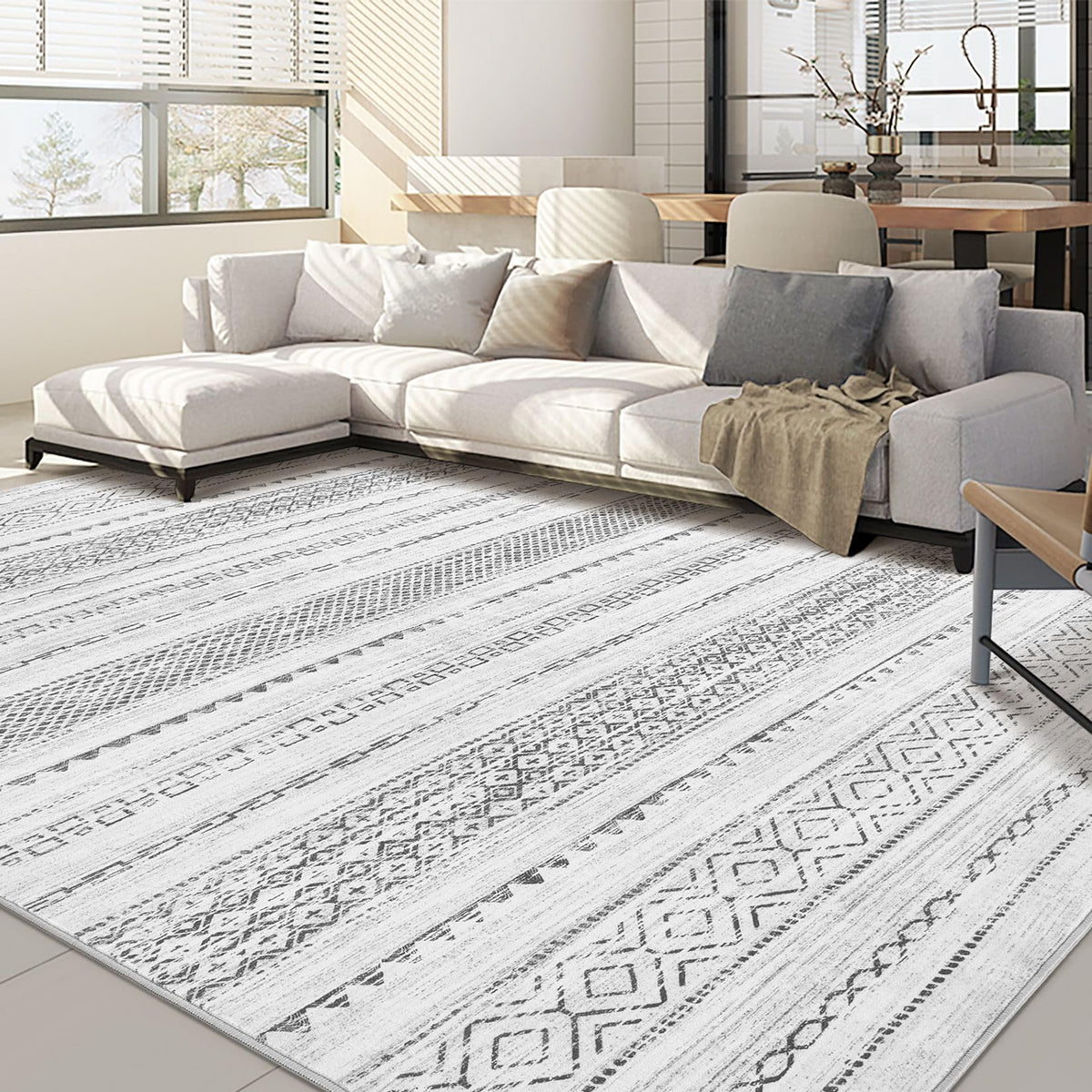 Nakagishi 9x12 area rug in living room with soft, comfortable texture for family spaces.