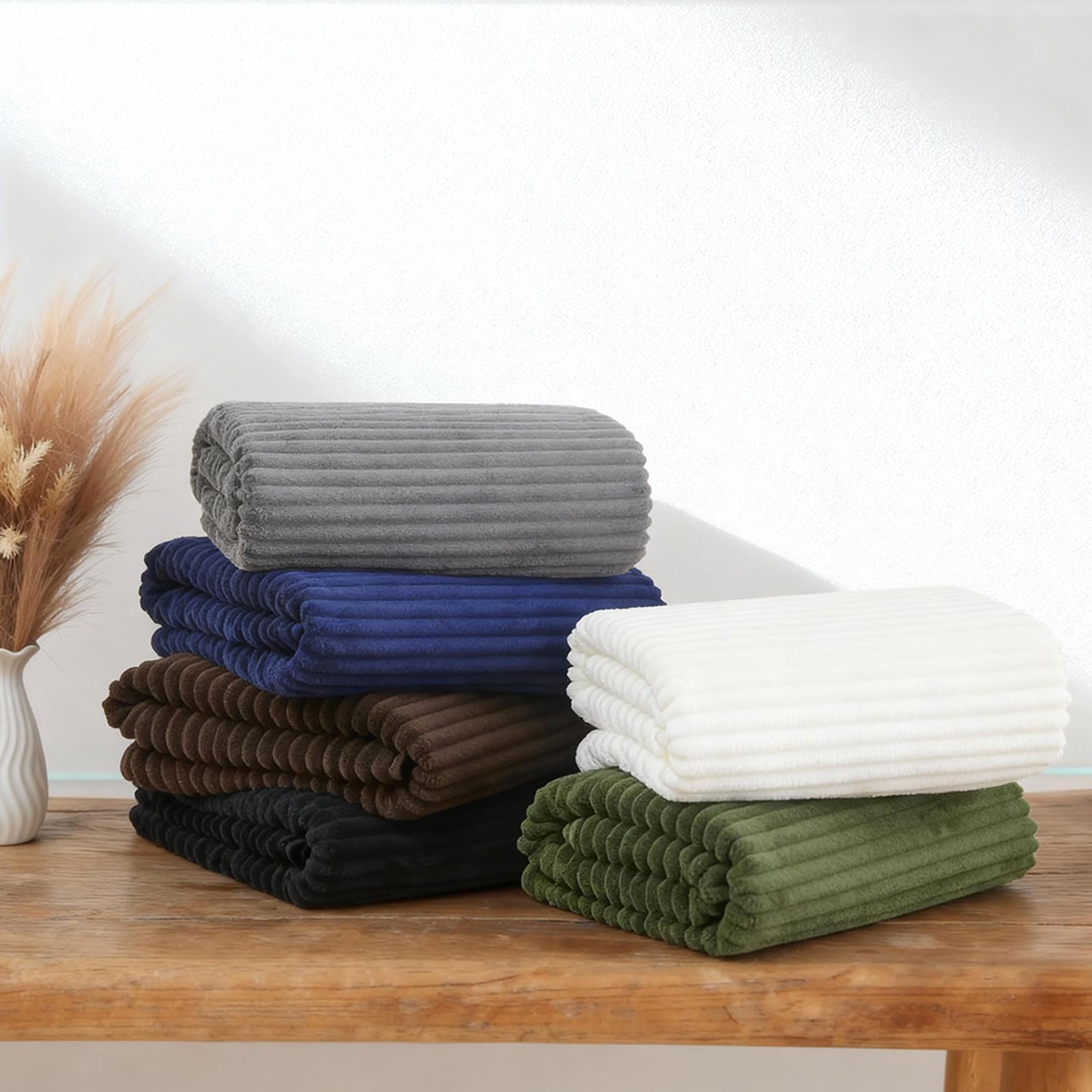 NALIVO spa style bathroom display with olive green towels for a luxurious setup.