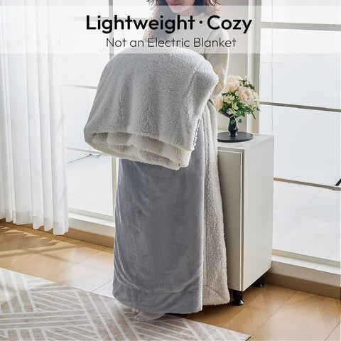 NANPIPER Sherpa Blanket light grey color complements any decor.