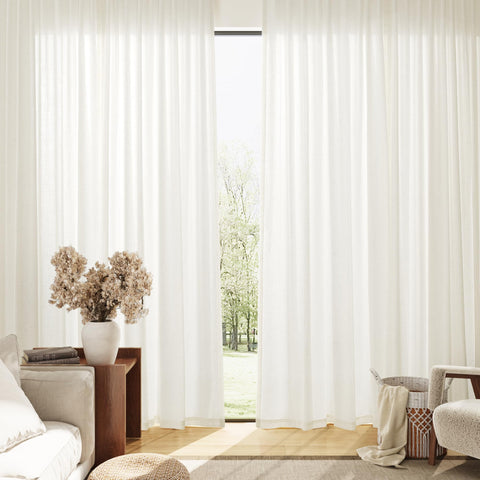 Nanspring linen curtains provide privacy while letting in natural light.