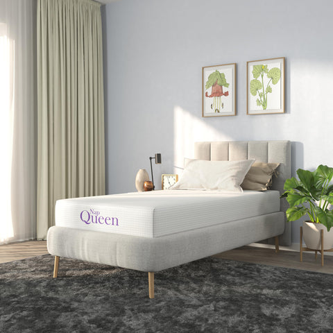 NapQueen mattress being unboxed and unrolled for easy setup.