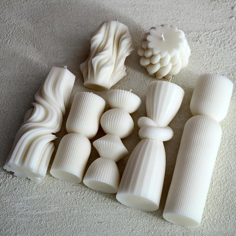NATCENSE close-up of handmade ribbed texture on pillar candles.